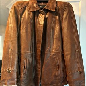 Tan leather jacket.